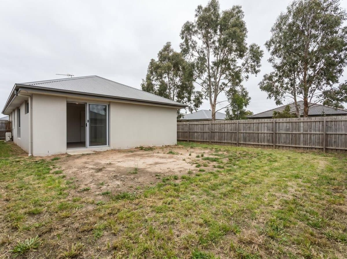 Bare, unused backyard before the Takara deck was built